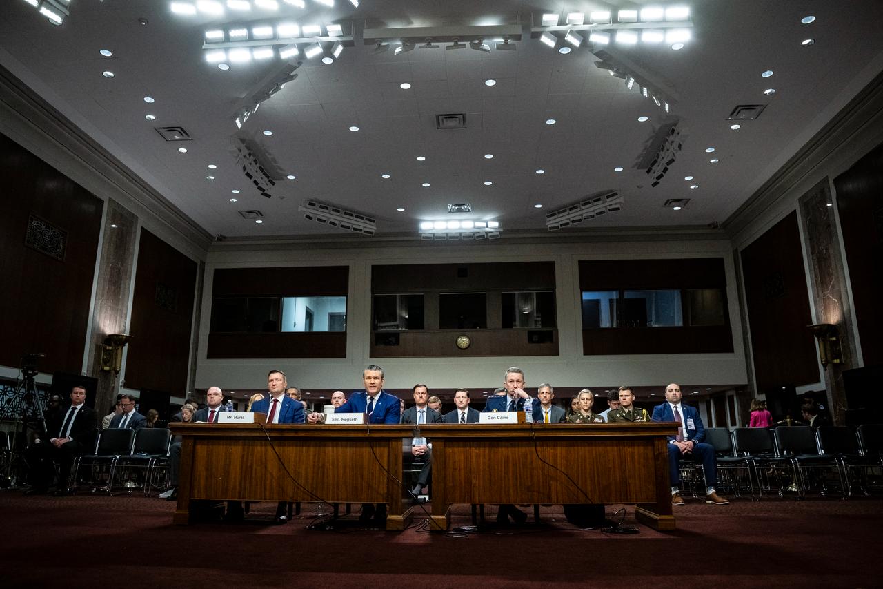 Acting Under Secretary of Defense Comptroller Jules Hurst (L), U.S. Secretary of Defense Pete Hegseth (C), and Chairman of the Joint Chiefs of Staff General Dan Caine (R) testify during a Senate Armed Services Committee hearing on April 30, 2026, in Washington, DC. (AFP Photo)