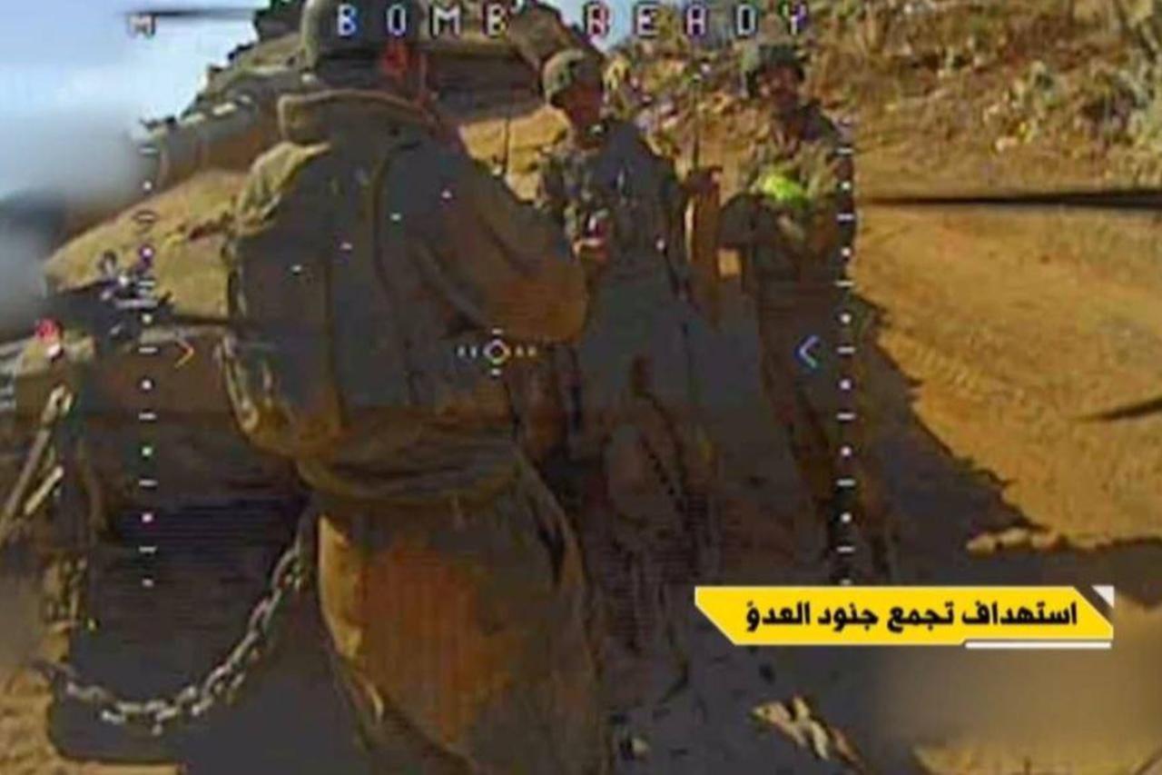 The photo shows Israeli soldiers from Hezbollah's FPV drone's POV in southern Lebanon at an unspecified time. (Photo via Telegram)