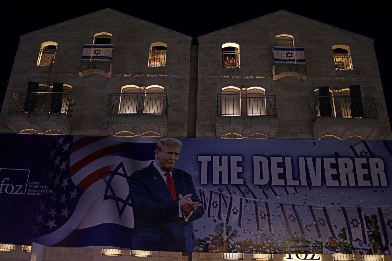 A banner depicting US President Donald Trump with the slogan “The Deliverer” is pictured in Jerusalem, Israel, April 30, 2026. (AFP Photo)