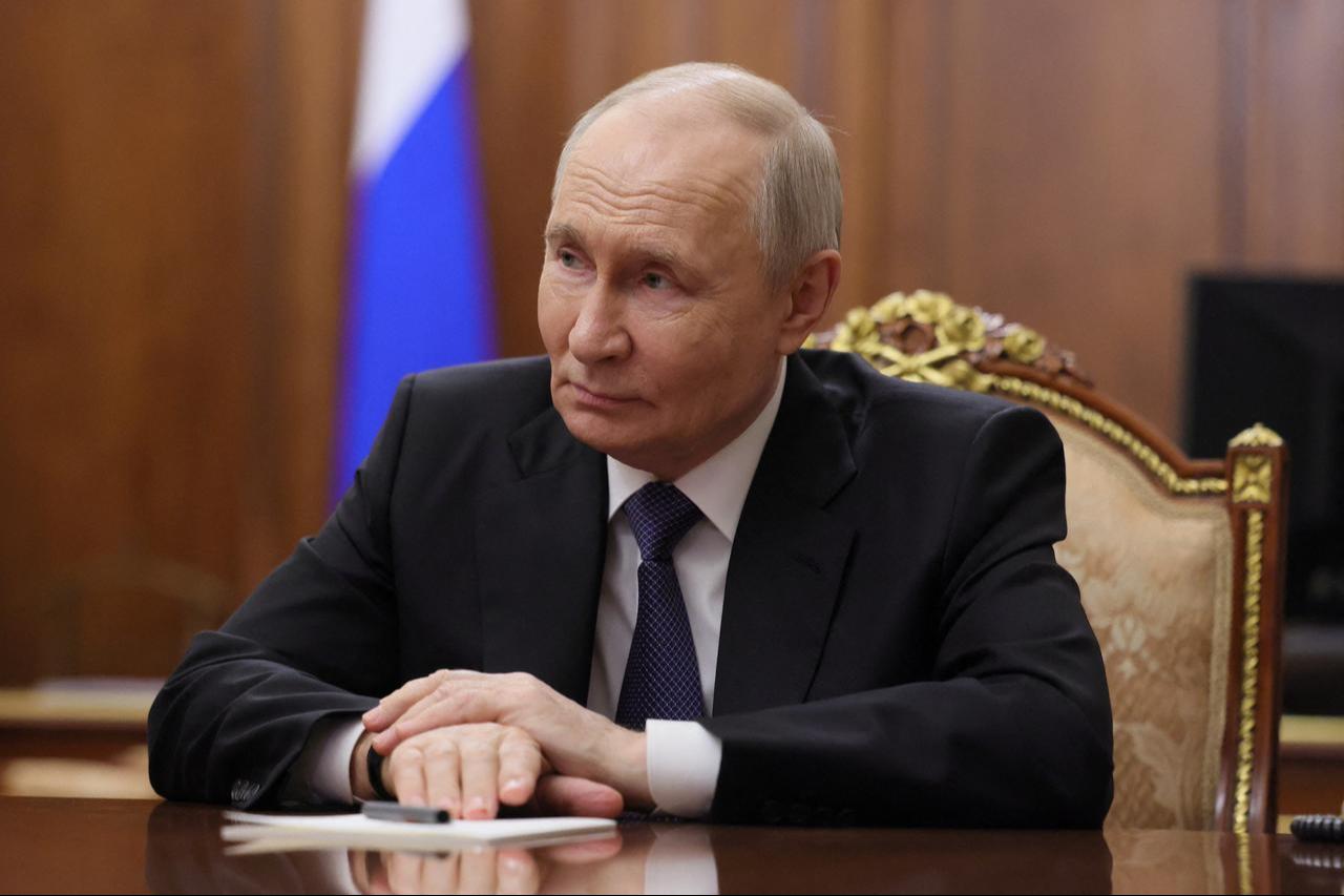 In this pool photograph distributed by the Russian state agency Sputnik, Russia's President Vladimir Putin looks on as he meets with Chechen leader at the Kremlin in Moscow, Russia, April 29, 2026. (AFP Photo)