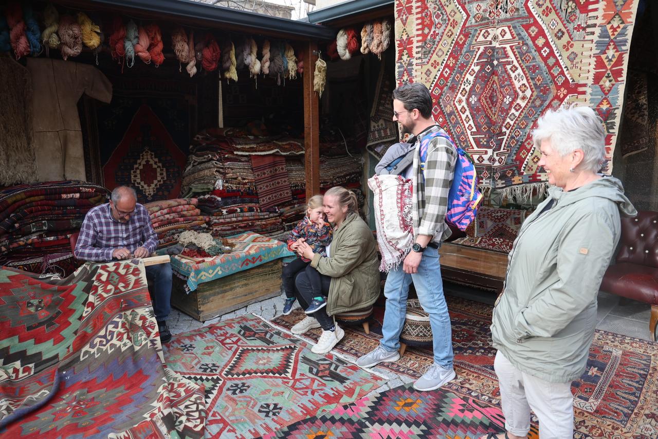 As interest from international tourists grows, antique carpet restoration in Cappadocia connects cultural heritage with global appreciation. Nevsehir, Türkiye, May 1, 2026. (IHA Photo)