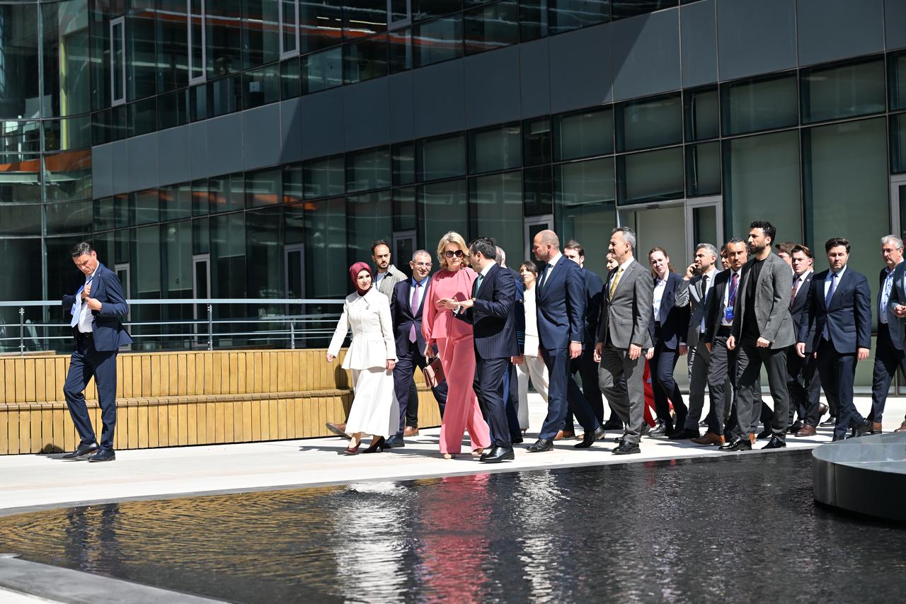 Belgian Queen Mathilde (C) is welcomed by Baykar Board Chairman, Selcuk Bayraktar (C-R), at the Ozdemir Bayraktar National Technology Center as part of an "Economic Mission" in Istanbul, Türkiye, on May 10, 2026. (AA Photo)