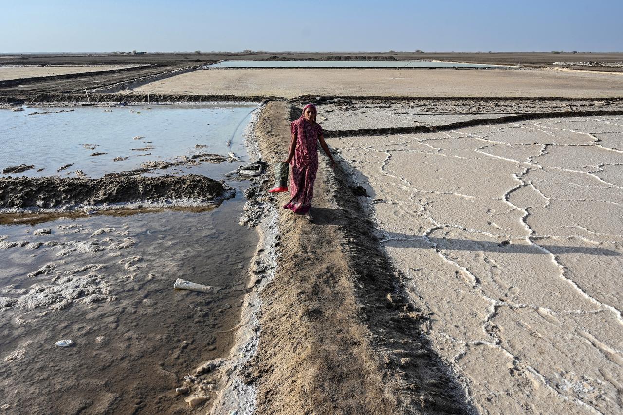 India's salt pan workers face longer seasons as heatwaves worsen
