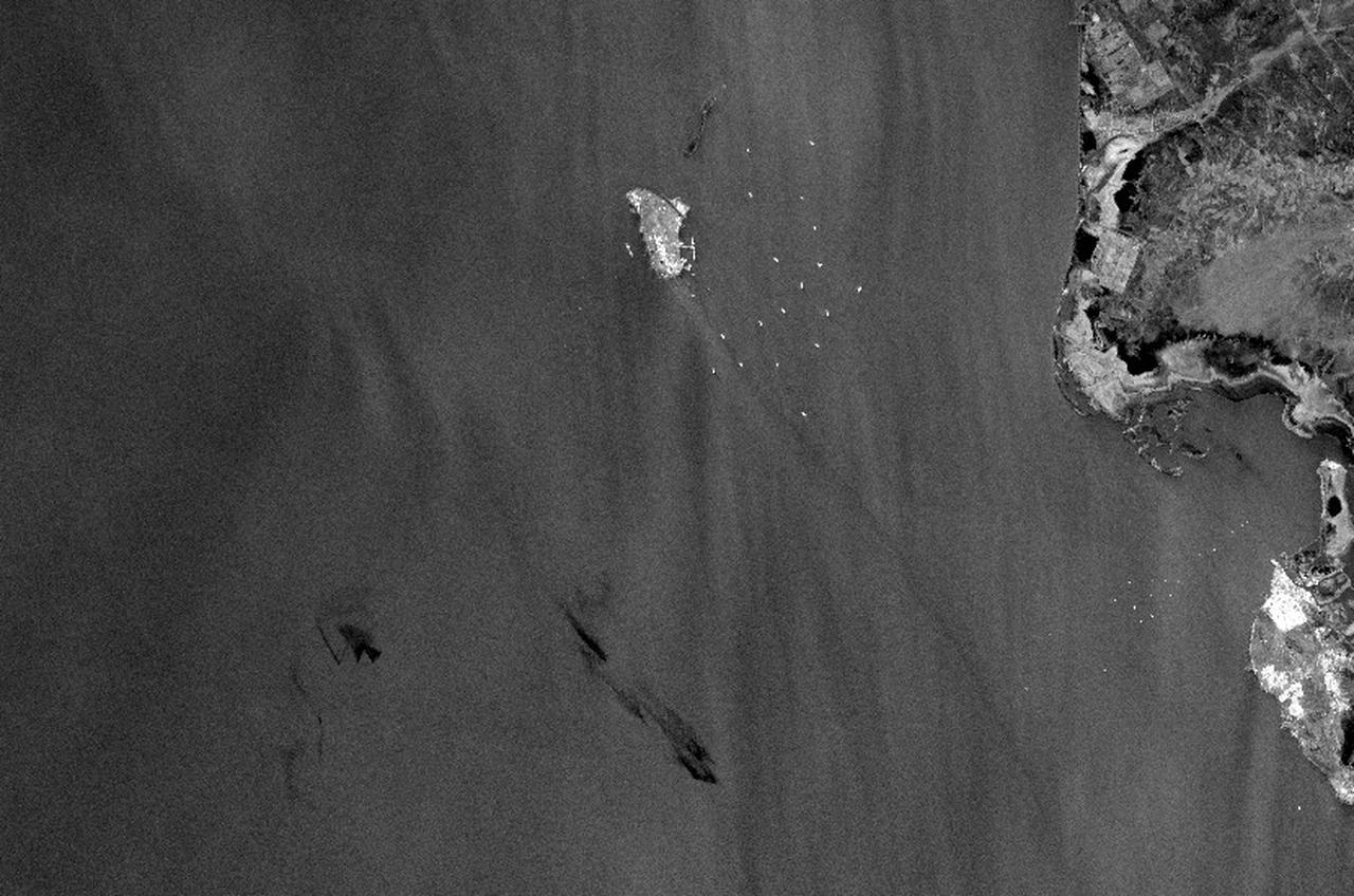 This satellite image, obtained from Copernicus Sentinel Data 2026 on May 9, 2026, appears to show an oil slick spreading off the coast of Kharg Island. (Photo by Copernicus Sentinel Data 2026/AFP)