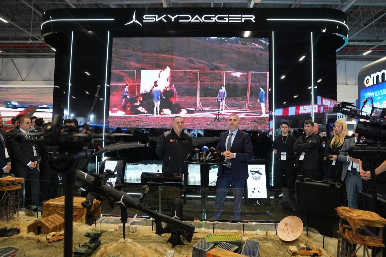 SAHA Istanbul Chairman Haluk Bayraktar (R) makes a speech during his visit to the Skydagger stand at the SAHA 2026 International Defense, Aerospace and Space Industry Fair in Istanbul, May 5, 2026. (AA Photo)