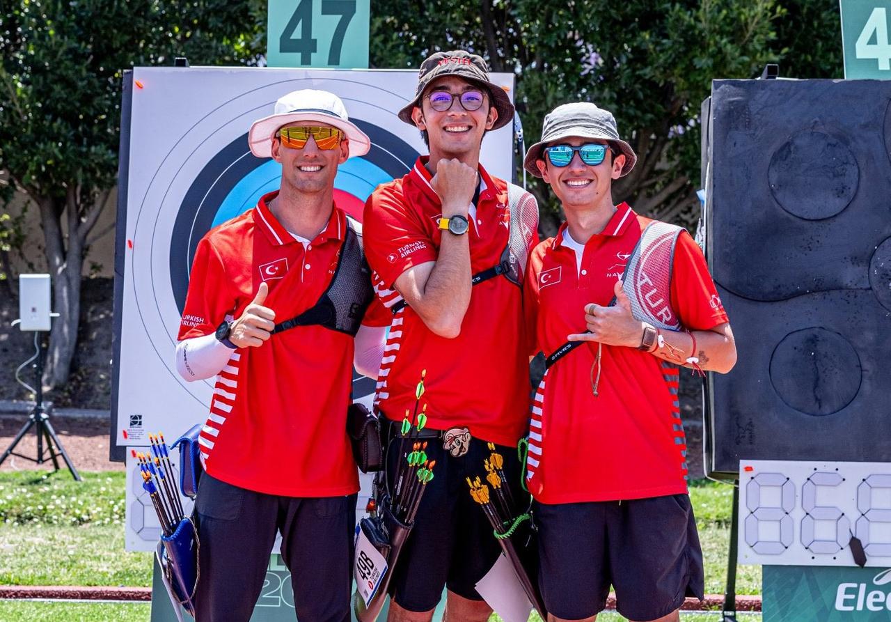 Turkish archers Mete Gazoz, Berkay Akkoyun and Ulaş Berkim Tümer pose after winning the silver medal against South Korea at the Archery World Cup, Shanghai, China, May 10, 2026. (Photo via World Archery)