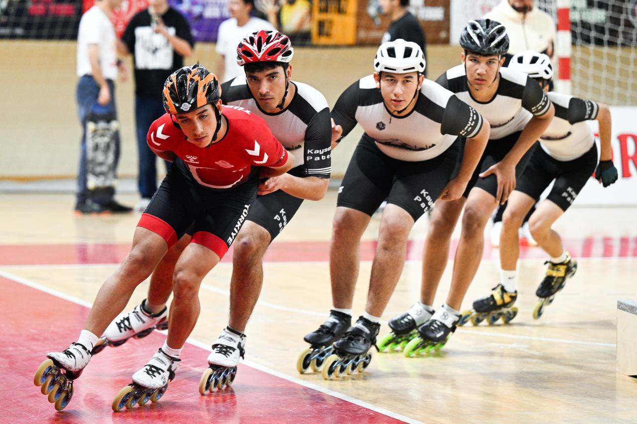 Roller skating athletes perform during the launch event of the Flying Skateboard Project organized by the Türkiye Skateboarding Federation at Atatürk Sports Hall in Kayseri, May 7, 2026. (AA Photo)