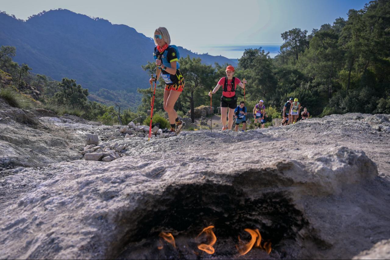 Athletes make their way uphill past the legendary Yanartas flames during the 12th Corendon Tahtali Run to Sky in Kemer, Antalya, May 2026. (Photo via Tahtali Run to Sky Organization)