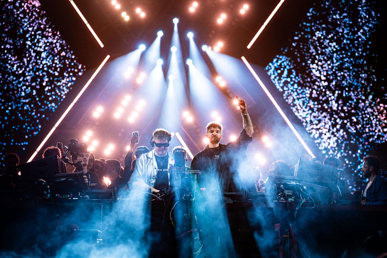 Swiss electronic music duo Adriatique perform as immersive visuals and lighting effects transform the stage into a large-scale audiovisual experience in Istanbul. (Photo via TemaCC)