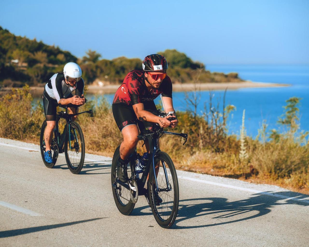 Athletes compete in the cycling stage of the 2026 Gelibolu Triathlon Middle Distance Turkish Championship on the historic Gallipoli Peninsula in Canakkale, Türkiye, May 10, 2026. (AA Photo)