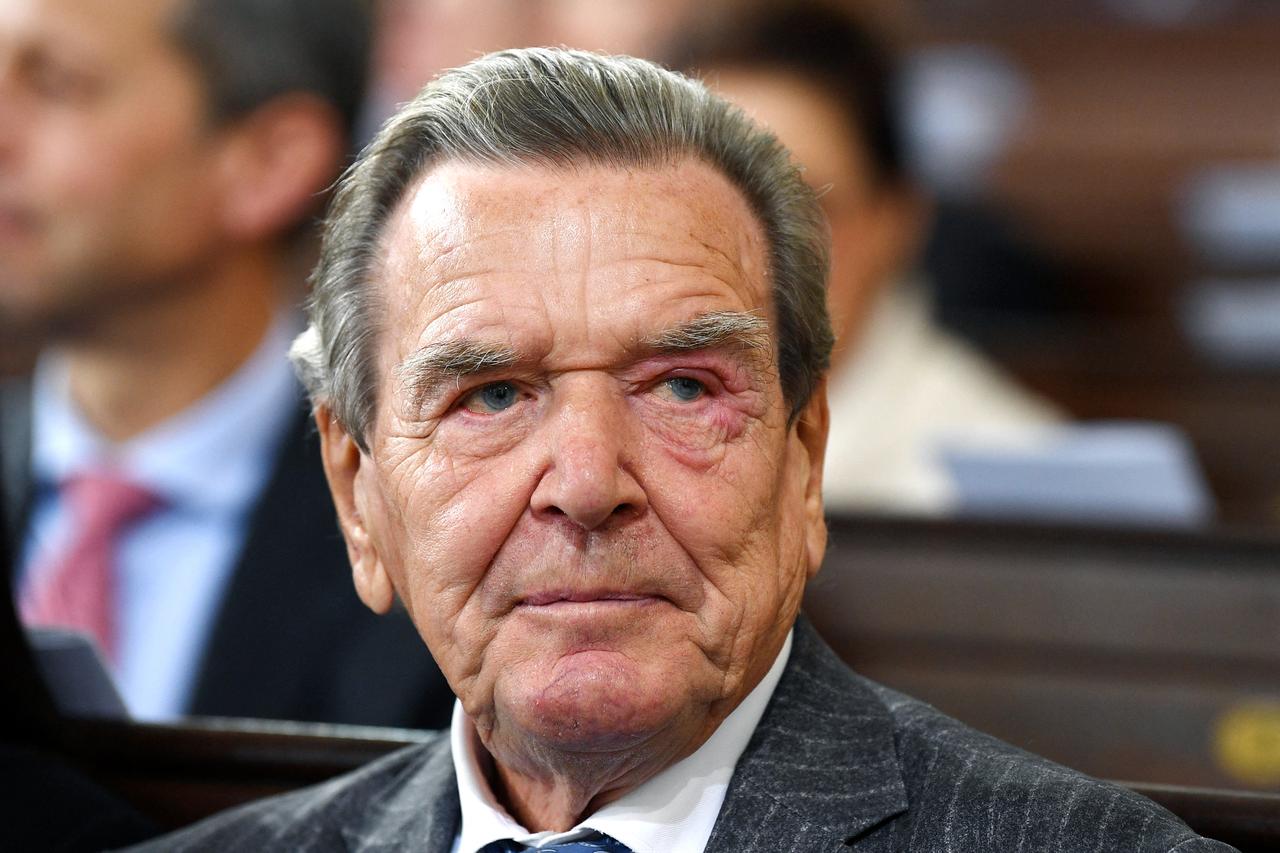 Former German Chancellor Gerhard Schroeder attends an ecumenical service on occasion of the celebration of the German reunification in the St Michaelis church in Hamburg, Germany, on October 3, 2023. (AFP File Photo)
