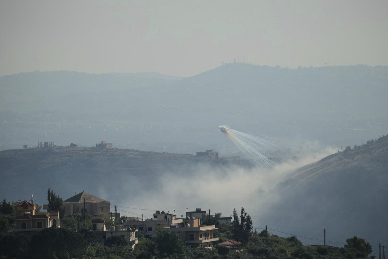 A photograph taken from the southern area of Marjayoun shows trails of smoke during Israeli shelling on the outskirts of the village of Yohmor on May 10, 2026. (AFP Photo)