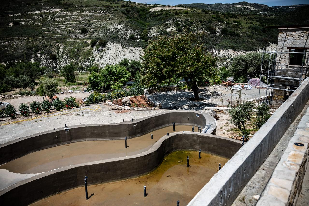 Construction and restoration work takes shape in the abandoned village of Trozena in Greek Cyprus. (Photo via Politis)