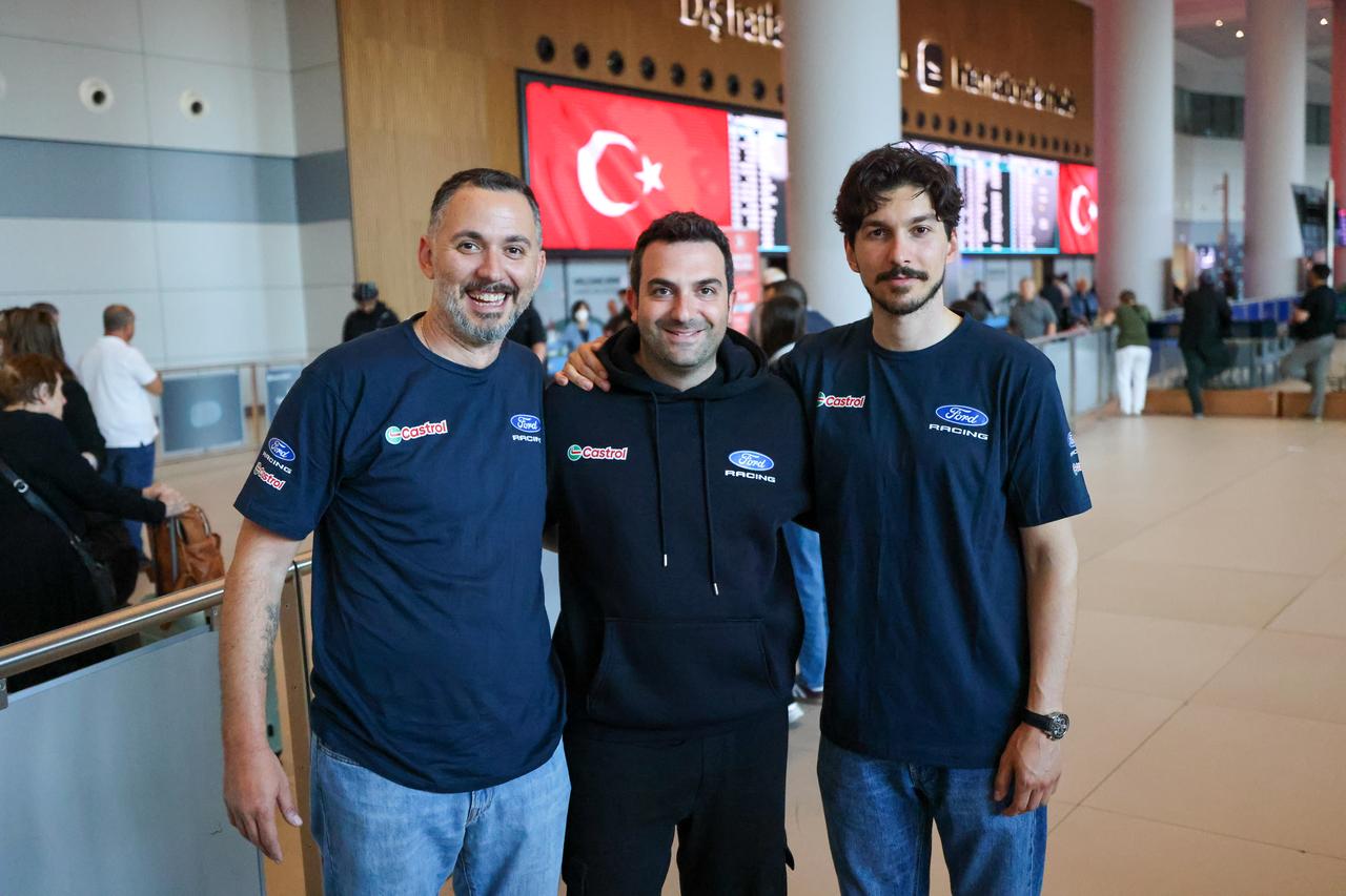Castrol Ford Team Türkiye driver Ali Turkkan (R) and co-driver Oytun Albayrak (L) are welcomed at Istanbul Airport after winning the Junior WRC category at Rally Portugal, in Istanbul, Türkiye, May 11, 2026. (AA Photo)