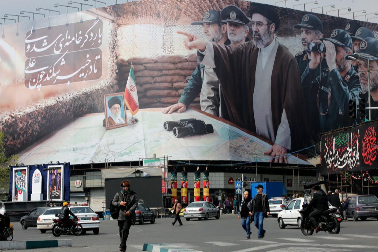 A view of a banner featuring Iran’s new Supreme Leader, Mojtaba Khamenei, and senior commanders of the Islamic Revolutionary Guard Corps (IRGC), on March 14, 2026. (AA Photo)
