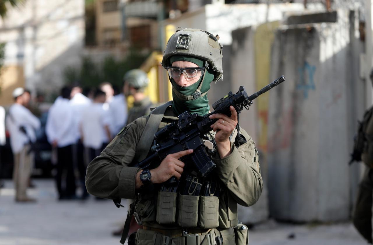 Israeli settlers raid the Old City of Hebron under the protection of Israeli security forces in the southern West Bank, Palestine, May 9, 2026. (AA Photo)