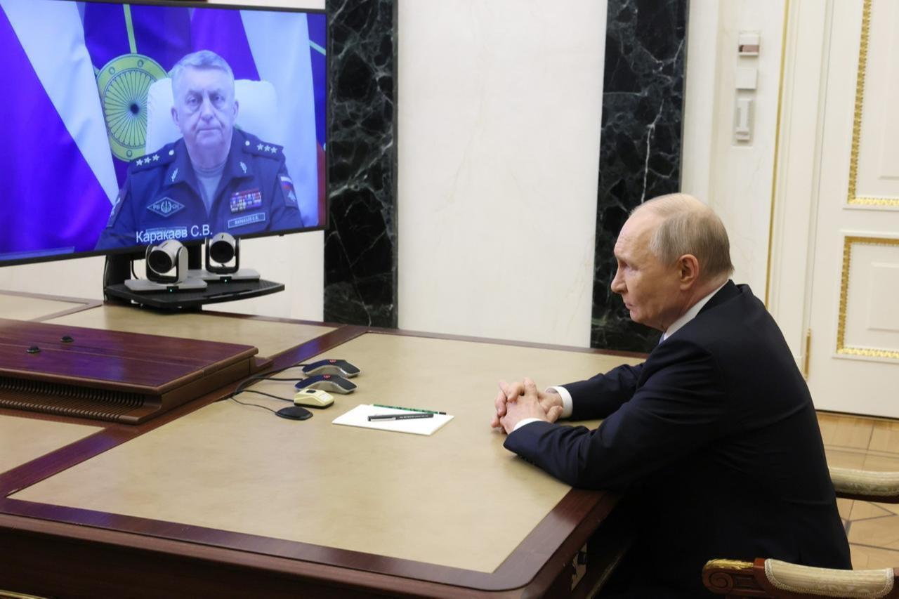 Vladimir Putin receives a report via videoconference from Commander of the Strategic Missile Forces Sergei Karakayev on the successful test of the Sarmat missile on May 12, 2026. (Photo via Kremlin)