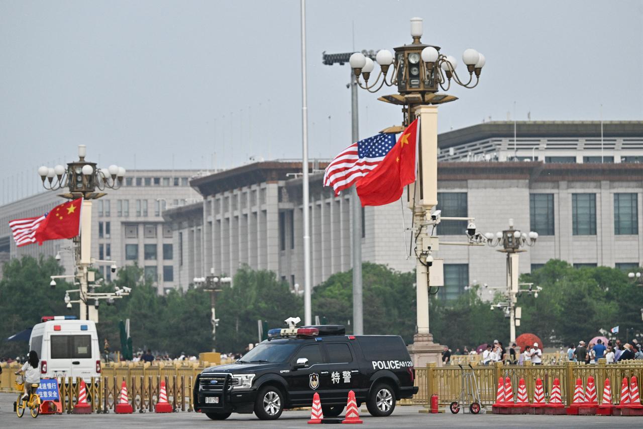 The national flags of the United States and China hang in front of Tiananmen Square in Beijing, China on May 13, 2026, ahead of a visit by US President Donald Trump. (AFP Photo)