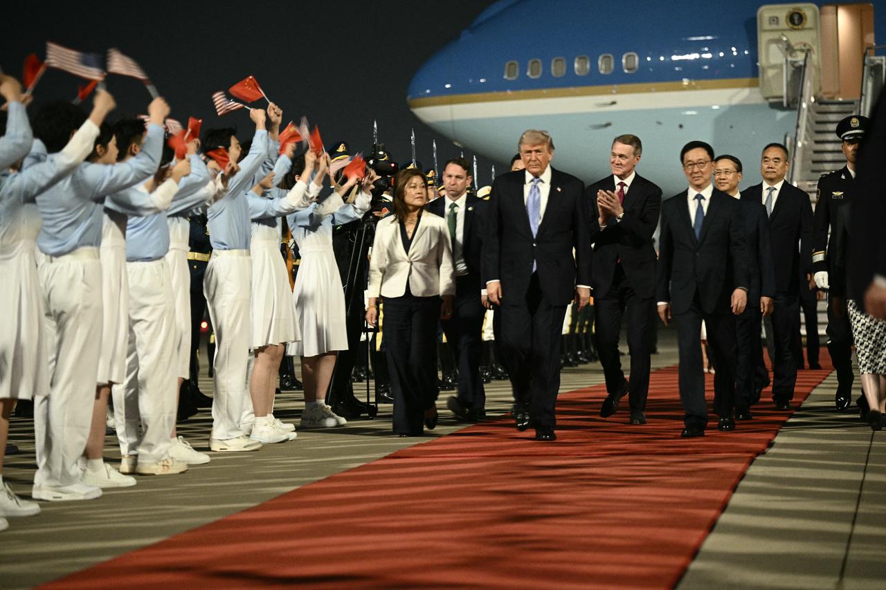 Trump lands in China for first US presidential visit in 9 years