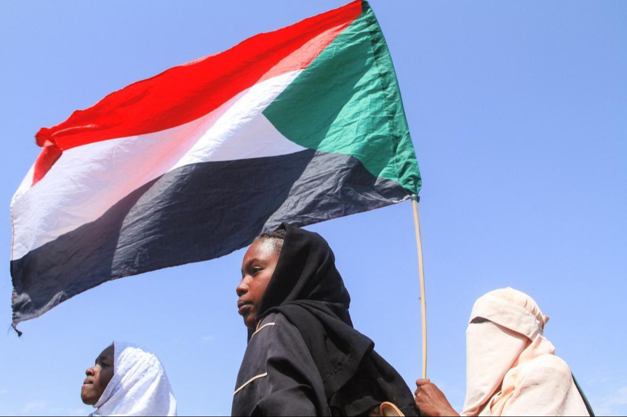 Sudanese students from schools in the East Nile region of the capital hold up the Sudan flag during a protest against violations committed by the RSF against the people of El- Fasher, in Khartoum, Sudan, November 3, 2025. (AFP Photo)