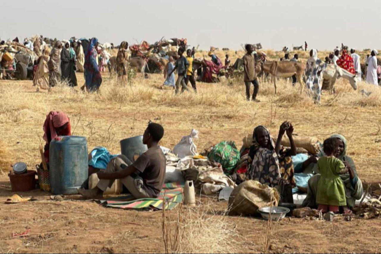 People who fled the Zamzam camp rest in a makeshift encampment in an open field near the town of Tawila in Darfur region, Sudan, April 13, 2025. (AFP Photo)