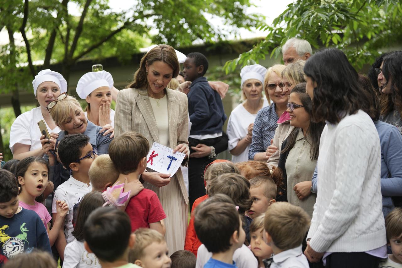 Britain's Catherine, Princess of Wales, meets with children in Reggio Emilia, Italy on May 14, 2026. (AFP Photo)