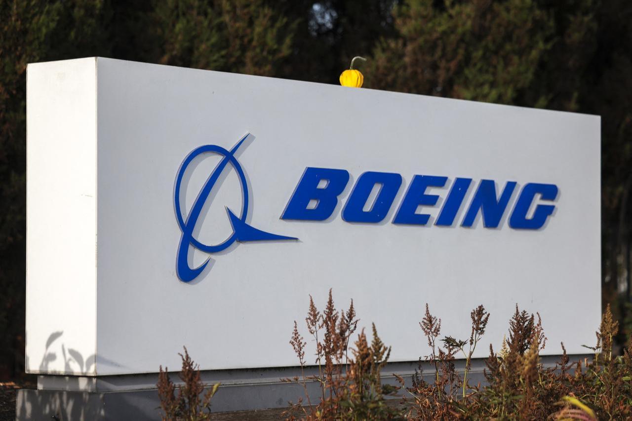 A Boeing sign is pictured outside the Renton Production Facility one day before striking union members will vote on a new contract offer in Renton, Washington on November 3, 2024. (AFP Photo)