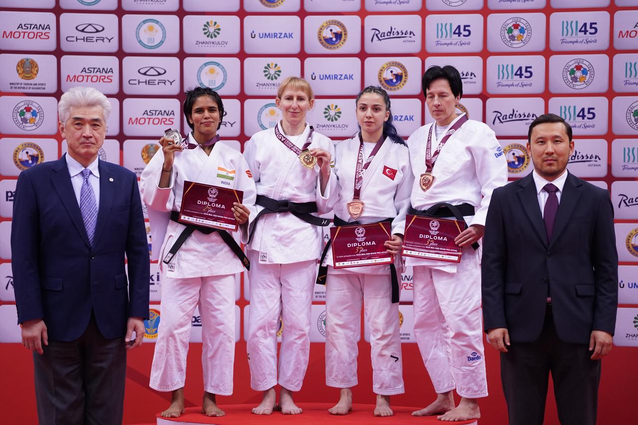Turkish judoka Zeynep Bozdemir stands on the podium after winning bronze in the J2 women’s -52 kg event in Astana, Kazakhstan on May 12, 2026. (Photo via X / @turkjudo)