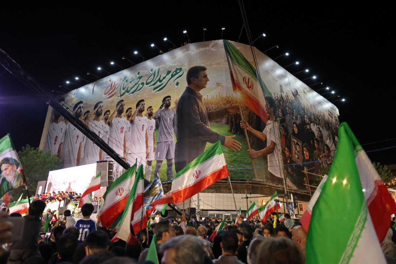 People gather for the farewell ceremony of Iran's national football team ahead of their departure for the 2026 FIFA World Cup in Tehran, May 13, 2026. (AFP Photo)