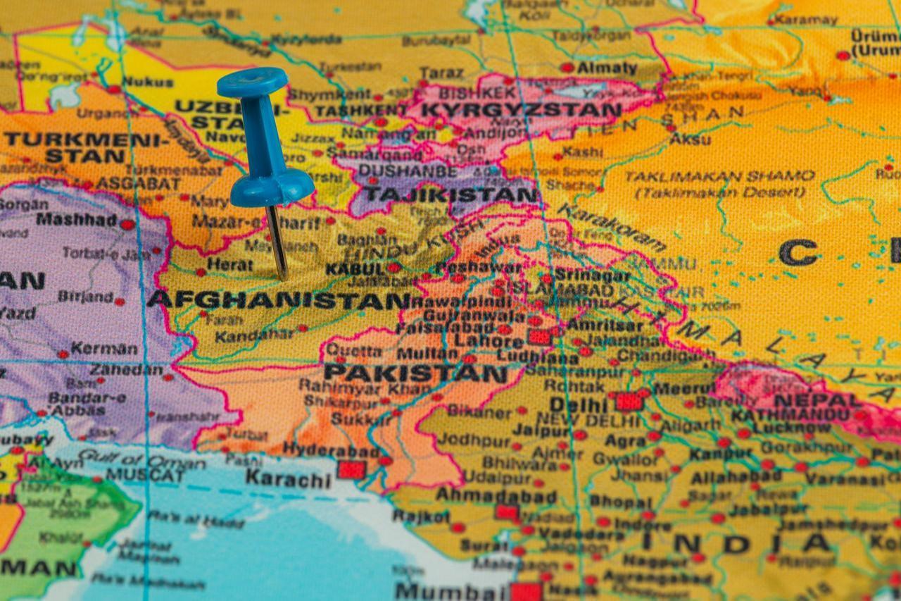 A detailed map displays Afghanistan in South Asia, marked with a blue pushpin as surrounding countries include Pakistan, Tajikistan, and Uzbekistan, showcasing regional geography, accessed on Dec. 3, 2025. (Adobe Stock Photo)