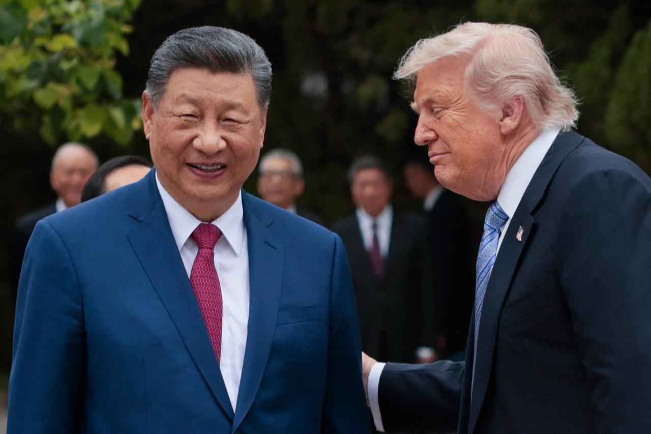 US President Donald Trump (R) speaks with China’s President Xi Jinping as he leaves after a visit to Zhongnanhai Garden in Beijing, May 15, 2026. (AFP Photo)
