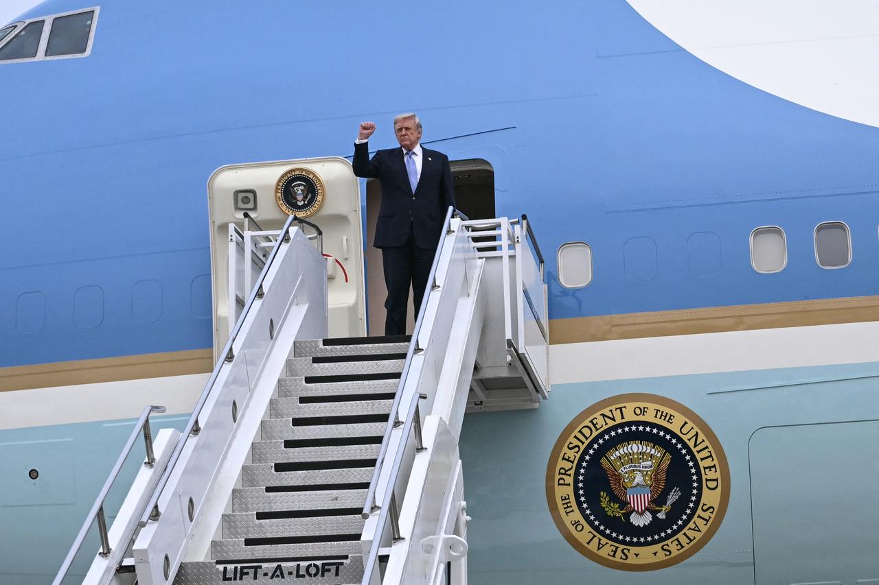 US President Donald Trump boards Air Force One before his departure from Beijing Capital Airport in Beijing on May 15, 2026. (AFP Photo)