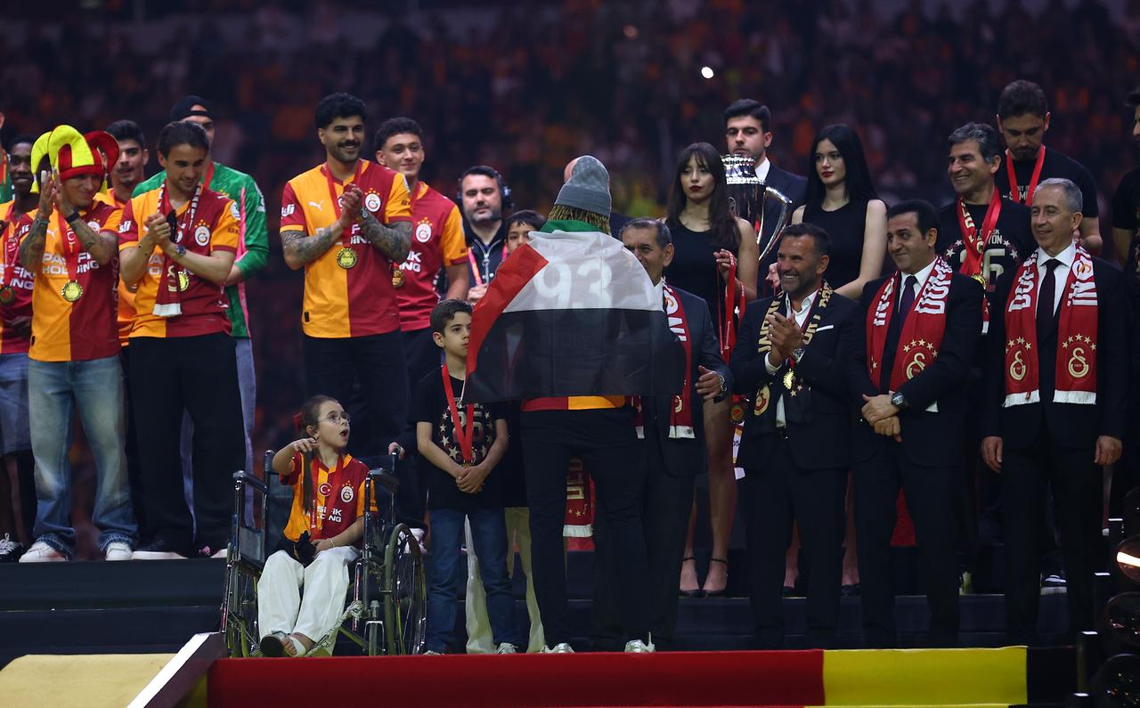 Sacha Boey appeared with a Palestinian flag during Galatasaray’s championship celebrations at RAMS Park in Istanbul, Türkiye, May 15, 2026. (IHA Photo)