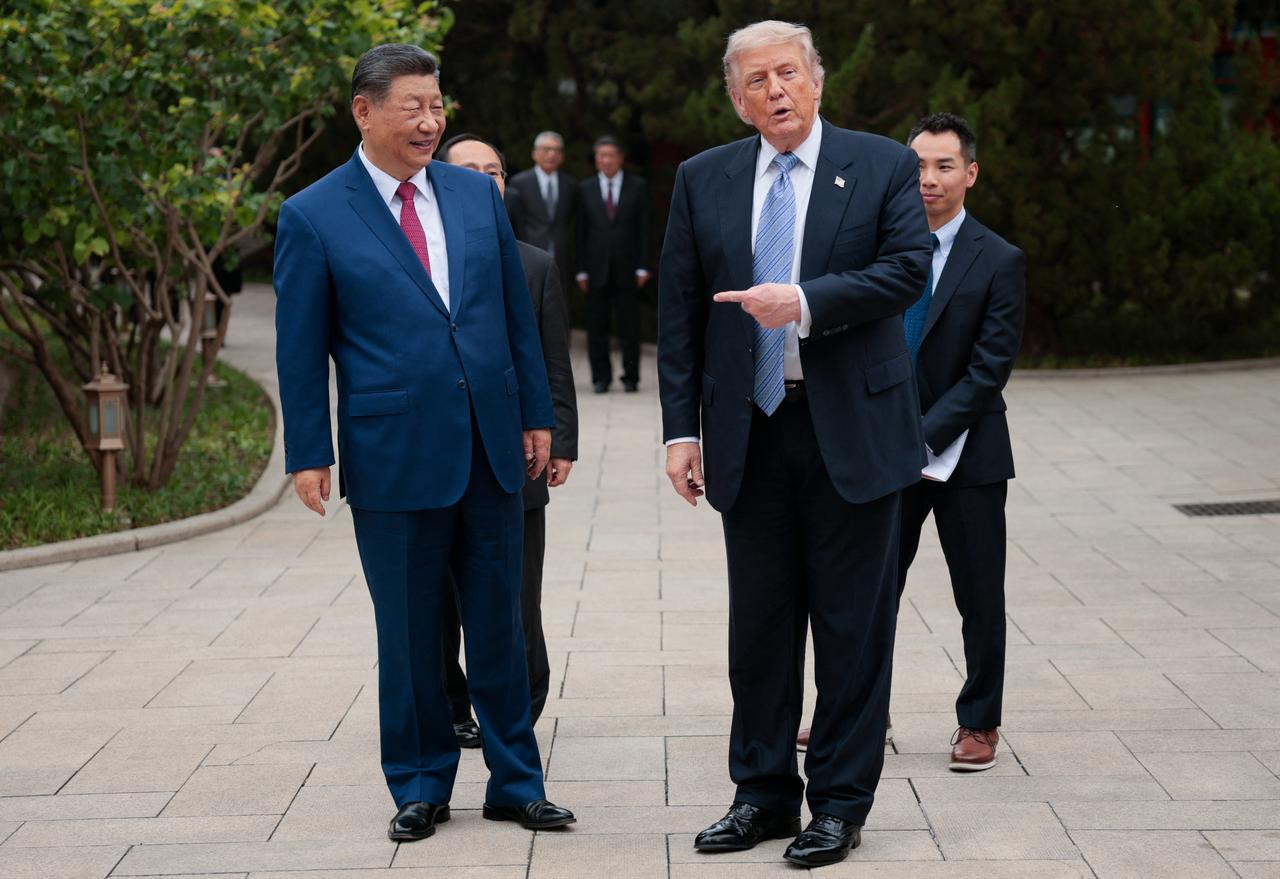 US President Donald Trump (R) gestures to China’s President Xi Jinping as he leaves after a visit to Zhongnanhai Garden in Beijing on May 15, 2026. (AFP Photo)