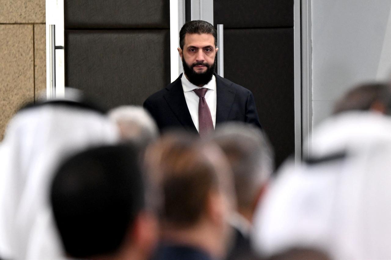 Syrian President Ahmed al-Sharaa arrives to attend the second day of the first Syrian-Emirati (United Arab Emirates) Investment Forum, at the People's Palace in Damascus on May 12, 2026. (AFP Photo)