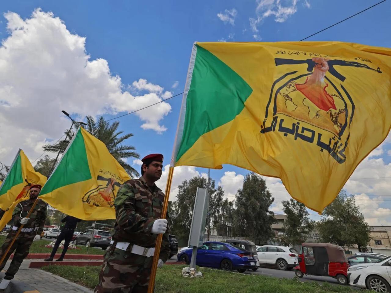 Members of Iraq's pro-Iran paramilitary group Kataeb Hezbollah mourn a comrade who was killed in a strike in Basra, during the funeral in Baghdad, April 8, 2026. (AFP Photo)
