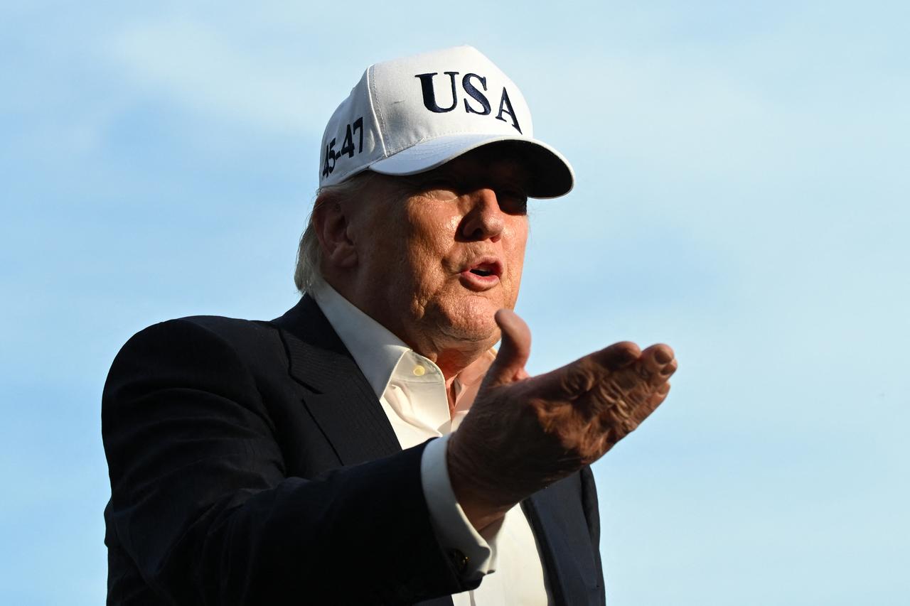 US President Donald Trump gestures as he speaks to reporters after arriving on the South Lawn of the White House in Washington, DC, May 15, 2026. (AFP Photo)