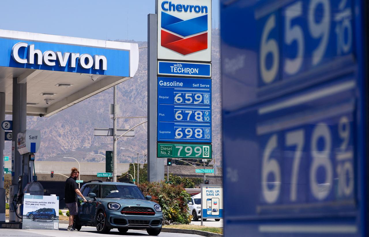 High gas prices are displayed at a Chevron gas station on May 11, 2026 in Pasadena, California. (AFP Photo)