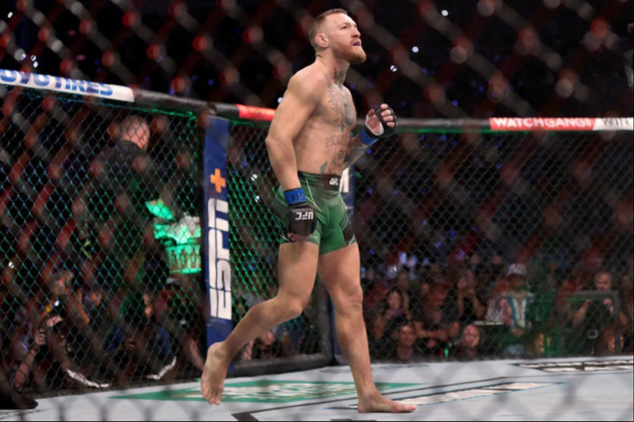 Conor McGregor of Ireland walks in the octagon before his lightweight bought against Dustin Poirier during UFC 264: Poirier v McGregor 3 at T-Mobile Arena in Las Vegas, Nevada on July 10, 2021 (AFP Photo)