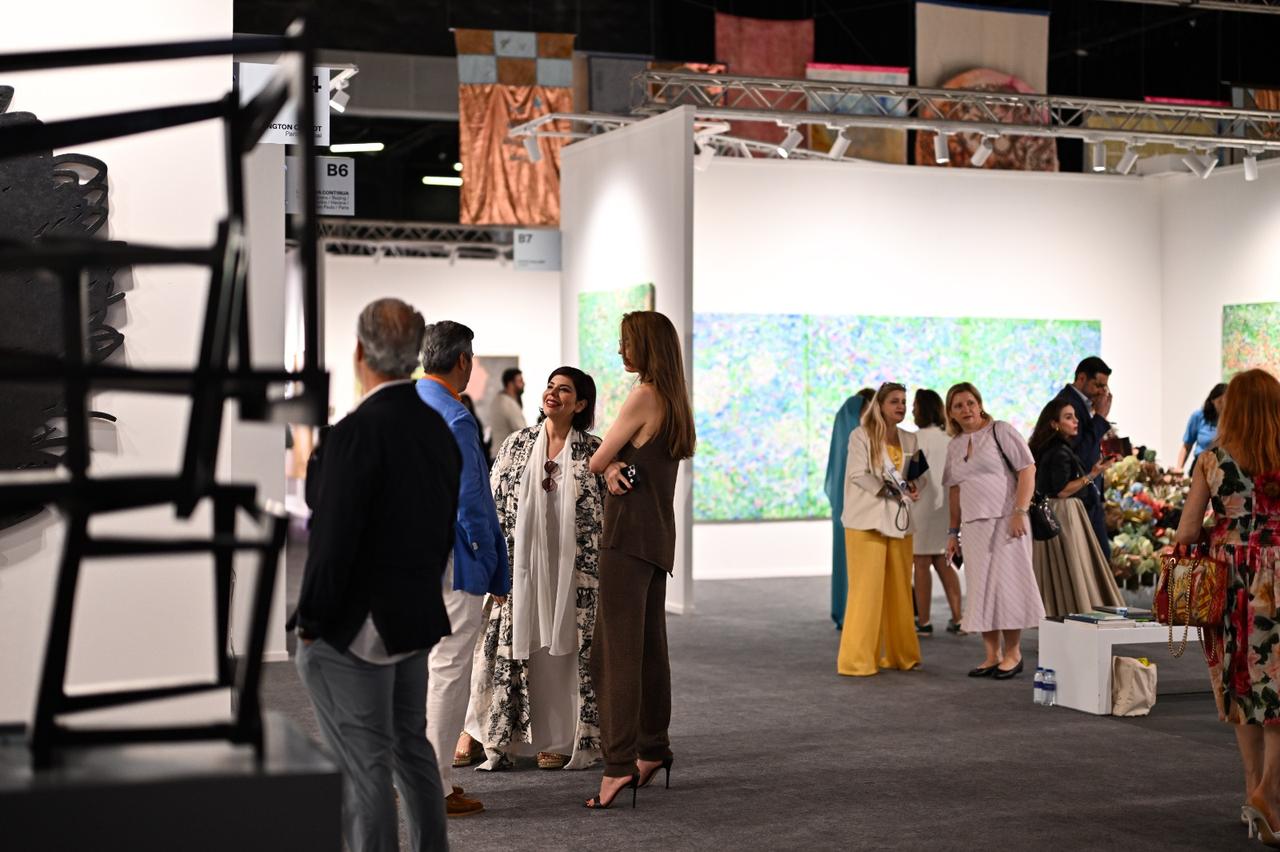 Visitors view artworks during Art Dubai’s 20th anniversary special edition at Madinat Jumeirah in Dubai, UAE, May 14, 2026. (Photo via Cedric Ribeiro/Art Dubai)