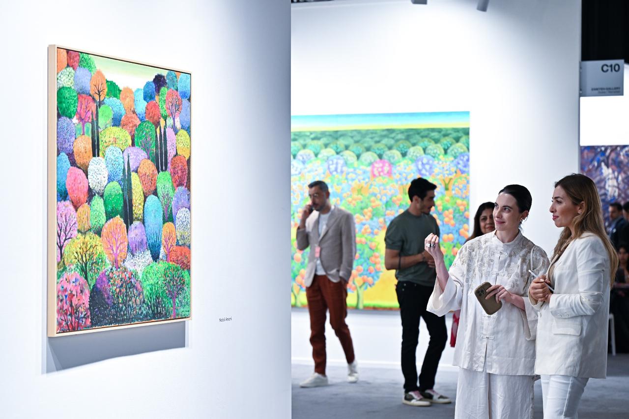 Visitors view artworks during Art Dubai’s 20th anniversary special edition at Madinat Jumeirah in Dubai, UAE, May 14, 2026. (Photo via Cedric Ribeiro/Art Dubai)