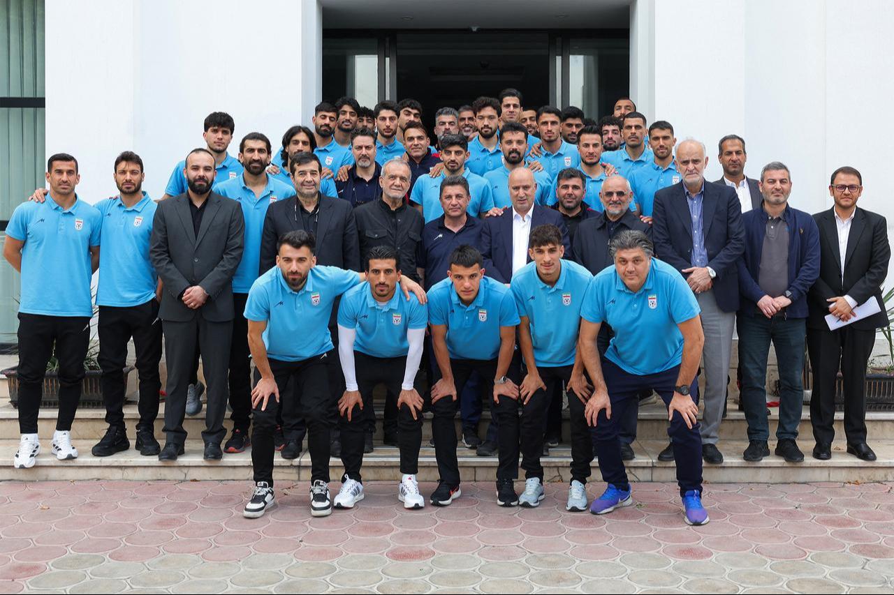 In this handout picture provided by the Iranian presidency, Iran's President Masoud Pezeshkian (C-L) poses for a group photo with players of the Iranian national football team, in Tehran on May 13, 2026. (AFP Photo)