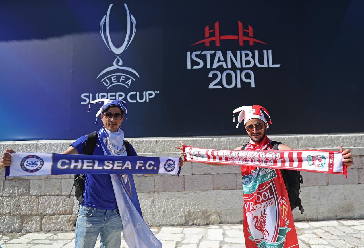 Soccer fans pose in front of the Besiktas Park stadium in Istanbul, Turkey, 13 August 2019. (IHA Photo)
