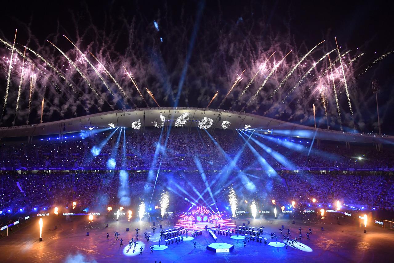 Dancers perform as fireworks are released during the kick off show ahead of the UEFA Champions League Final soccer match between Manchester City and Inter Milan, in Istanbul, Turkey, 10 June 2023.  (IHA Photo)
