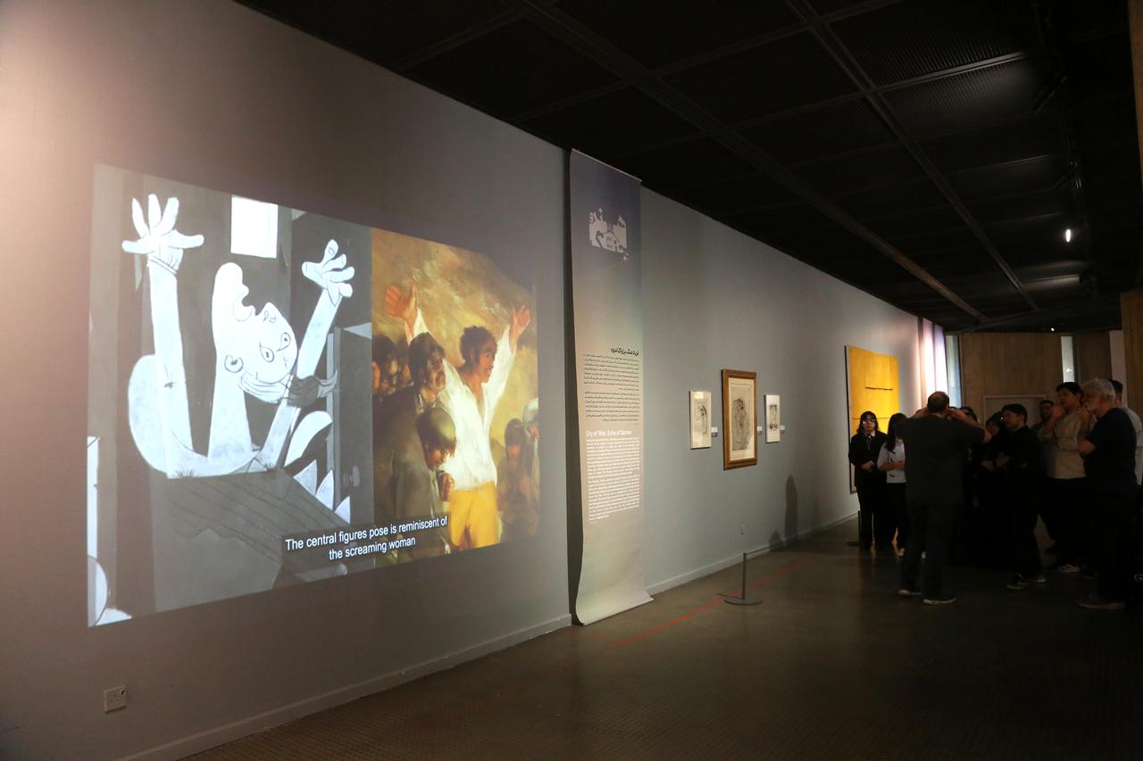 People visit “Art and War” exhibition, reflecting the impact of war on modern art while also serving as a voice for those crushed under its weight, at the Museum of Contemporary Art in Tehran, Iran, May 16, 2026. (AA Photo)