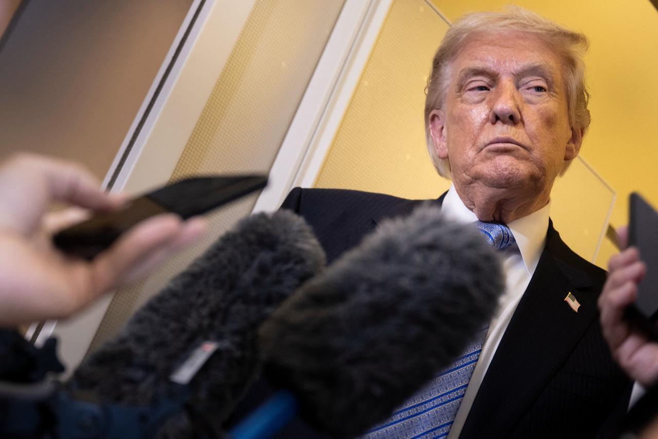 US President Donald Trump speaks to reporters aboard Air Force One after his departure from Beijing Capital Airport on May 15, 2026, on his way back to the United States. (AFP Photo)