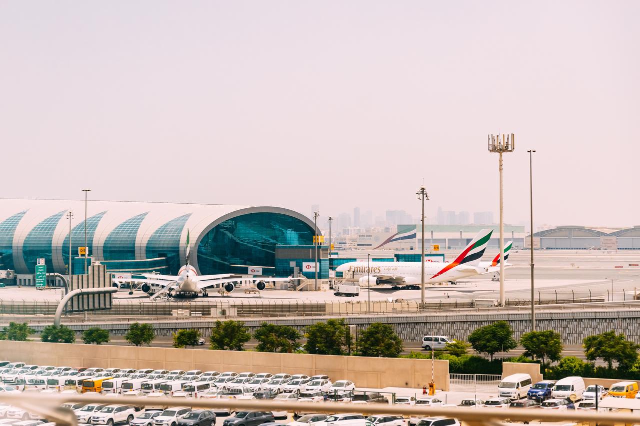 Emirates aircraft are seen parked at Dubai International Airport in Dubai, United Arab Emirates, May 28, 2021. (Adobe Stock Photo)
