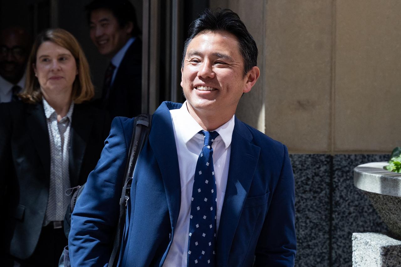 Deputy General Counsel for OpenAI Renny Hwang departs court at the Ronald V. Dellums Federal Building on May 18, 2026 in Oakland, California. (AFP Photo)