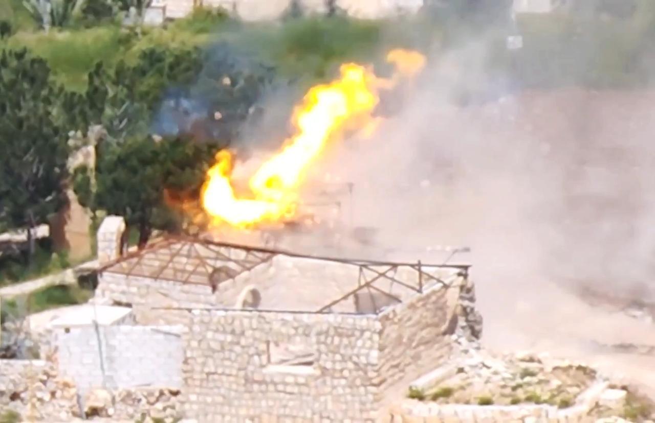 The photo shows an Israeli Merkava MK4 tank experiencing an ammunition cookoff after Hezbollah's FPV drone strike in southern Lebanon at an unspecified time. (Photo via Telegram)