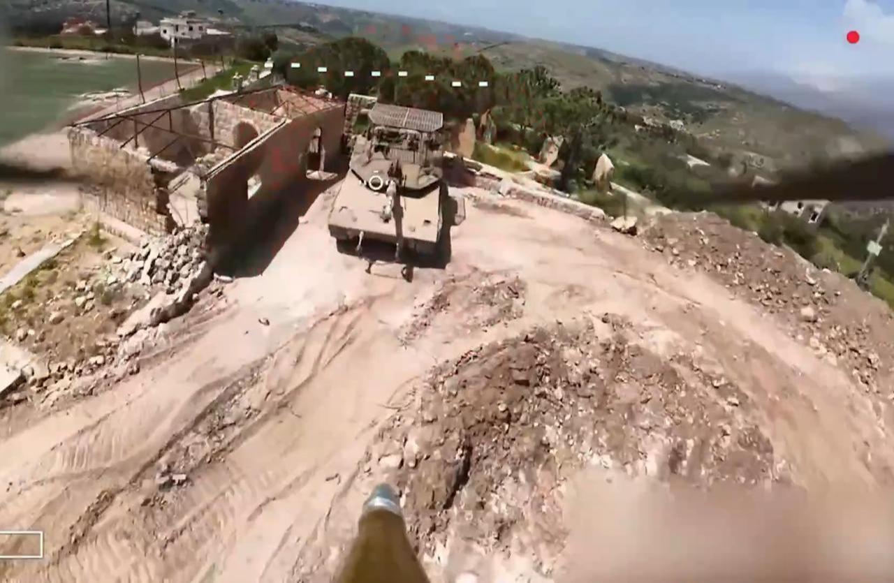 The photo shows an Israeli Merkava MK4 tank from Hezbollah's FPV drone's POV in southern Lebanon at an unspecified time. (Photo via Telegram)